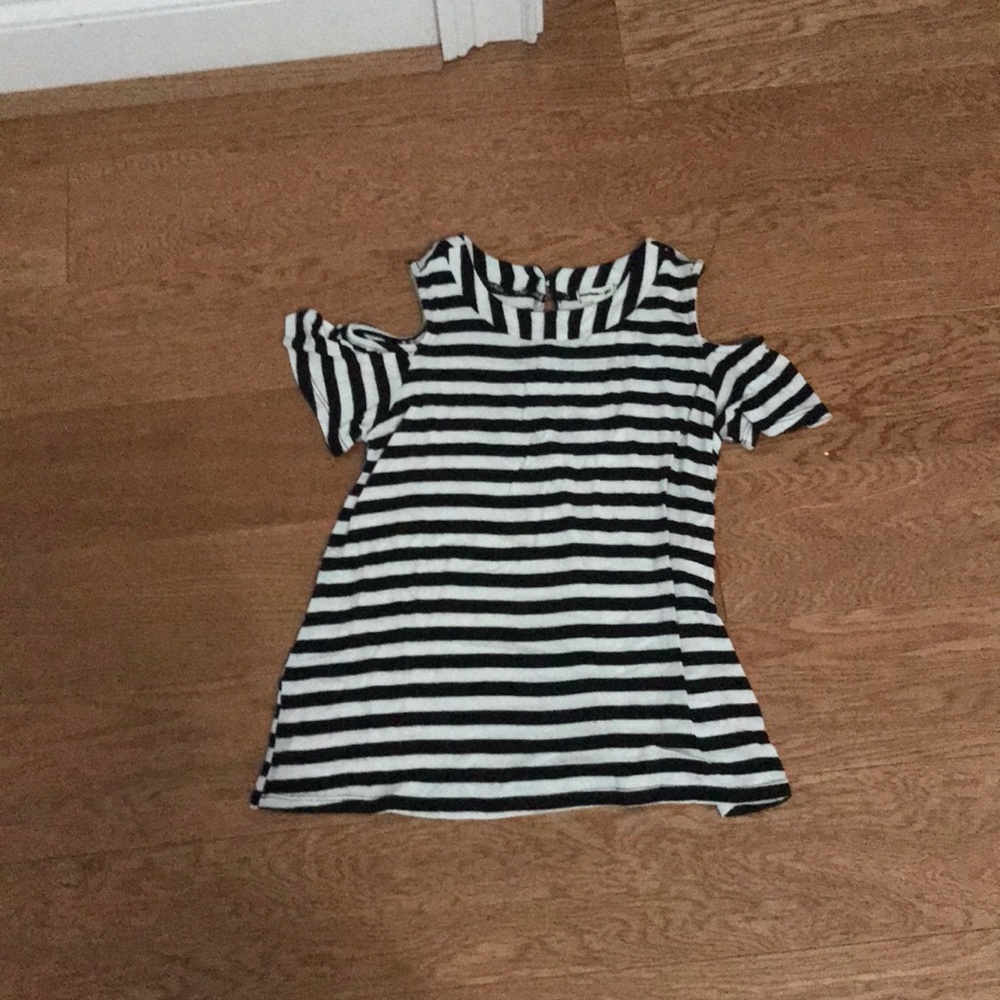 t shirt and it has holes for the sholders